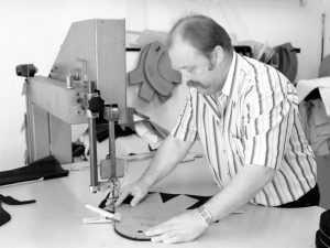 Master Bullmann cutting fabric