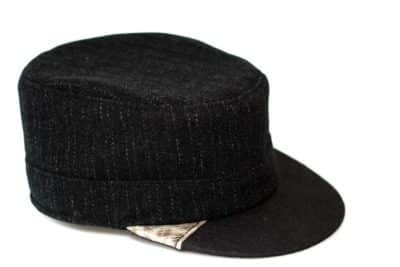 Black cap with wolffishskin detail.