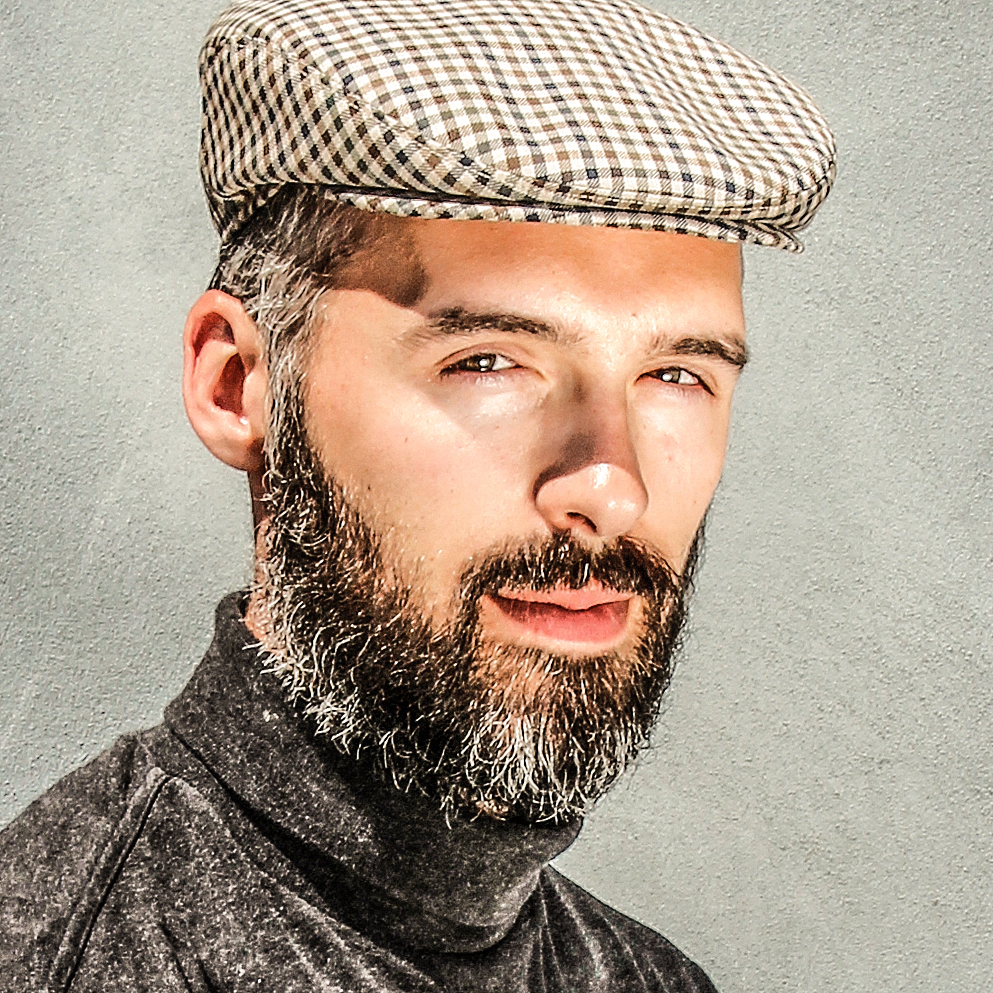 A Wilgart Flatcap on a bearded man. Cool Wool